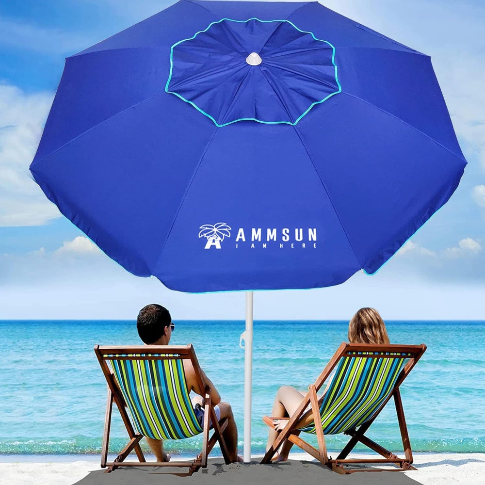 A couple relaxing on beach chairs, enjoying the sun under an AMMSUN 6.5ft blue large beach umbrellas for sand