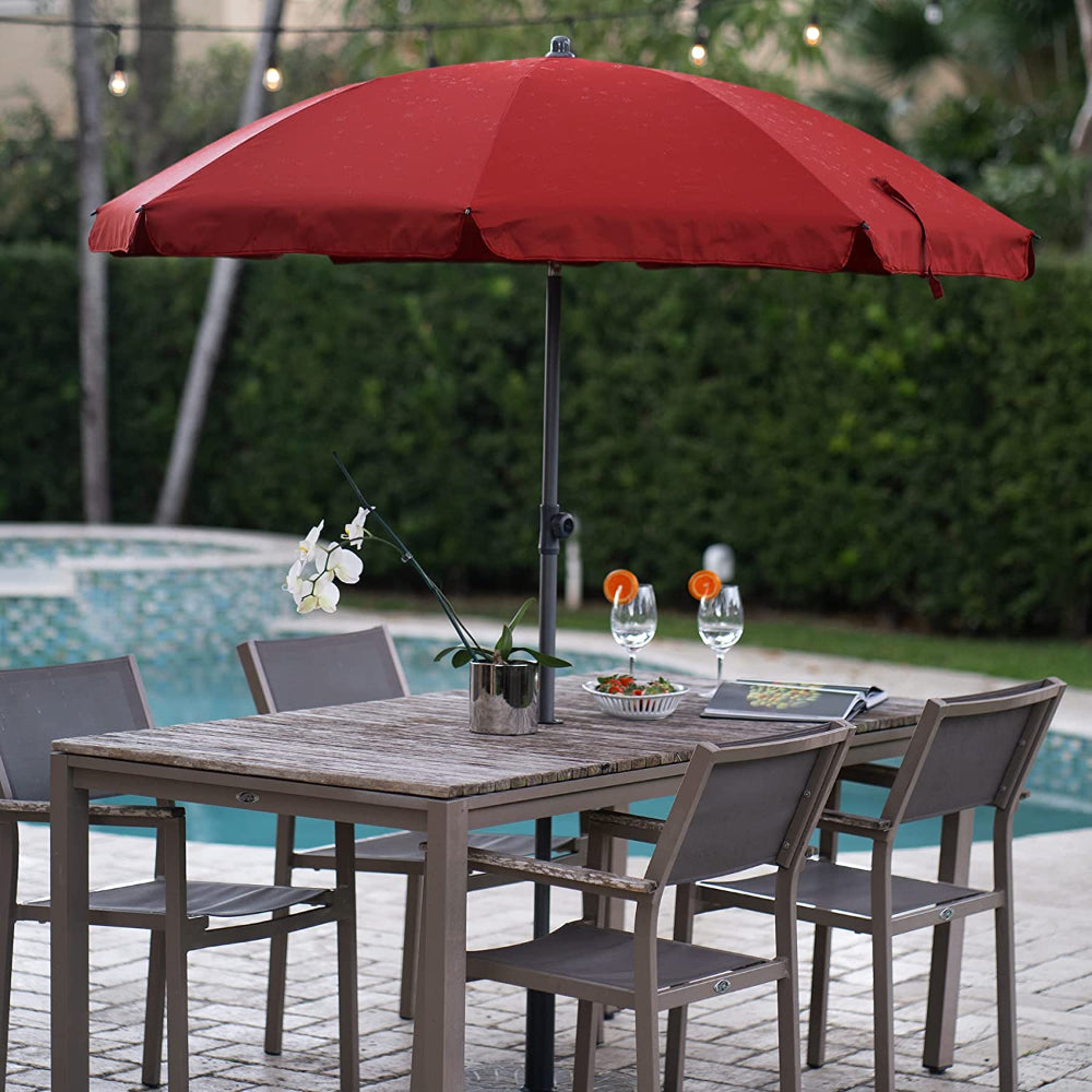 AMMSUN 6.5ft maroon red umbrella outdoor patio is placed on the patio table, providing shade for outdoor space.