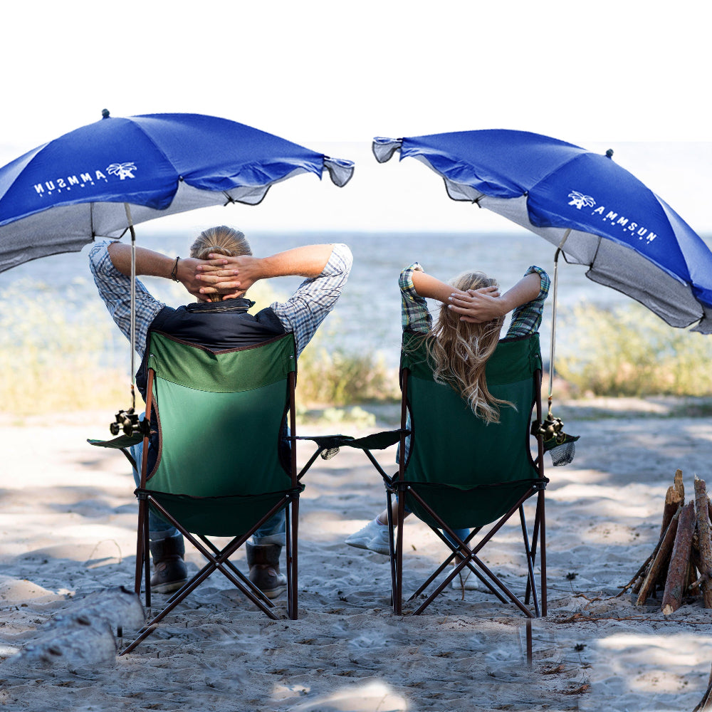 Two people sitting beneath two blue AMMSUN 52 inches 360-degree chair umbrella with universal clamps clip on  chairs