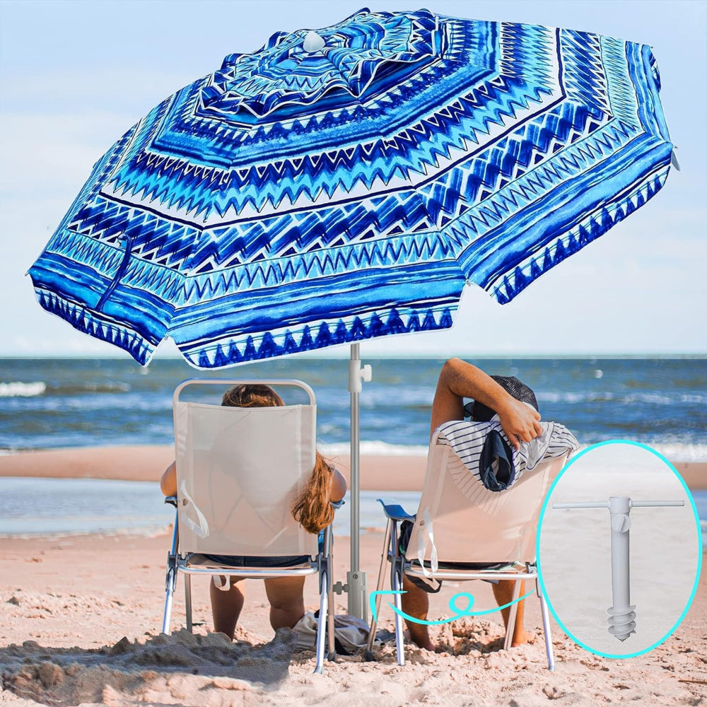 Two individuals relax under an AMMSUN 6.5ft manhattan wave umbrella portable with sand anchor