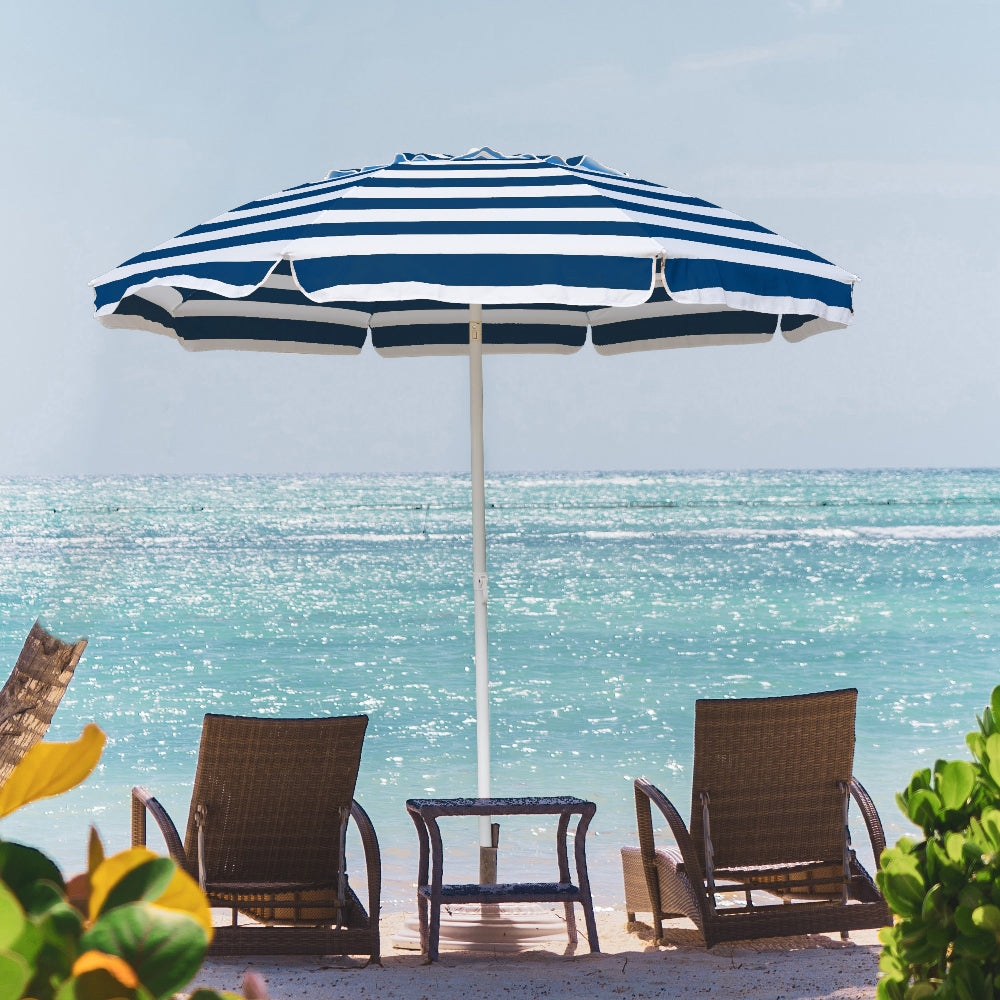 AMMSUN 6.5ft dark blue striped patio umbrella small wind resistant umbrella stands on the sandy beach