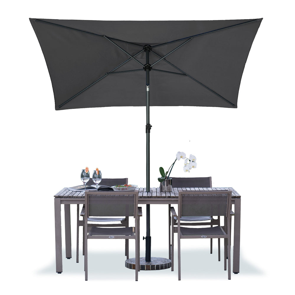 A patio setting featuring a table with an AMMSUN  6.6 x 4.3ft grey Rectangular large umbrella outdoor patio table umbrellas and several chairs