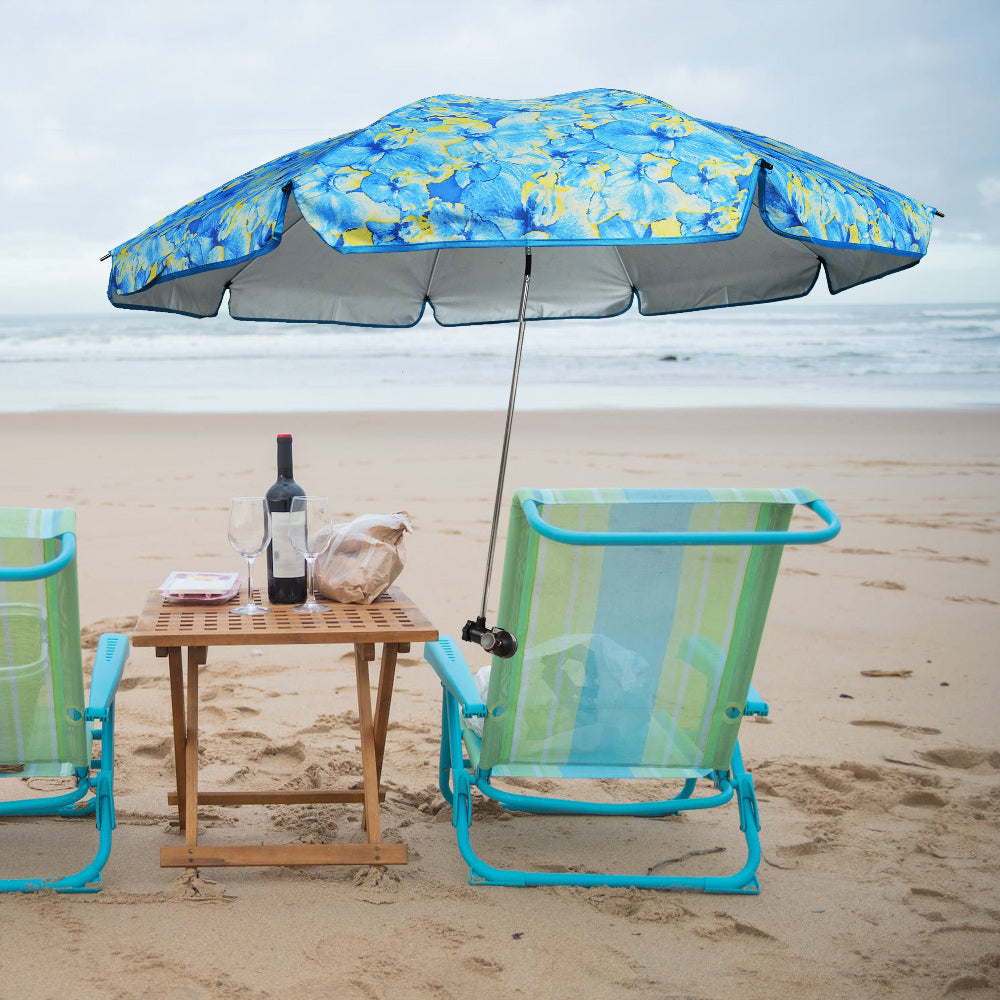 A beach chair with an AMMSUN Vibrant Flowers 52 inches large outdoor umbrella for chair with universal clamp