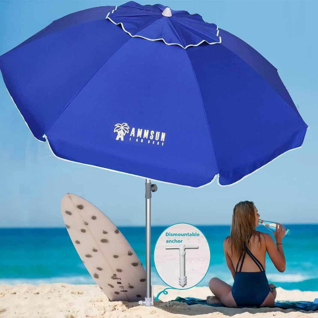 A woman in a bathing suit relaxes on the beach under an AMMSUN 7ft blue beach large umbrellas with sand anchor