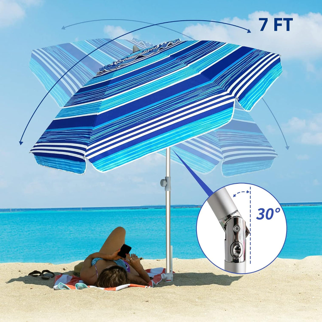 A woman is lying under AMMSUN 7ft multicolor light blue stripes beach umbrella with sand anchor and tilt