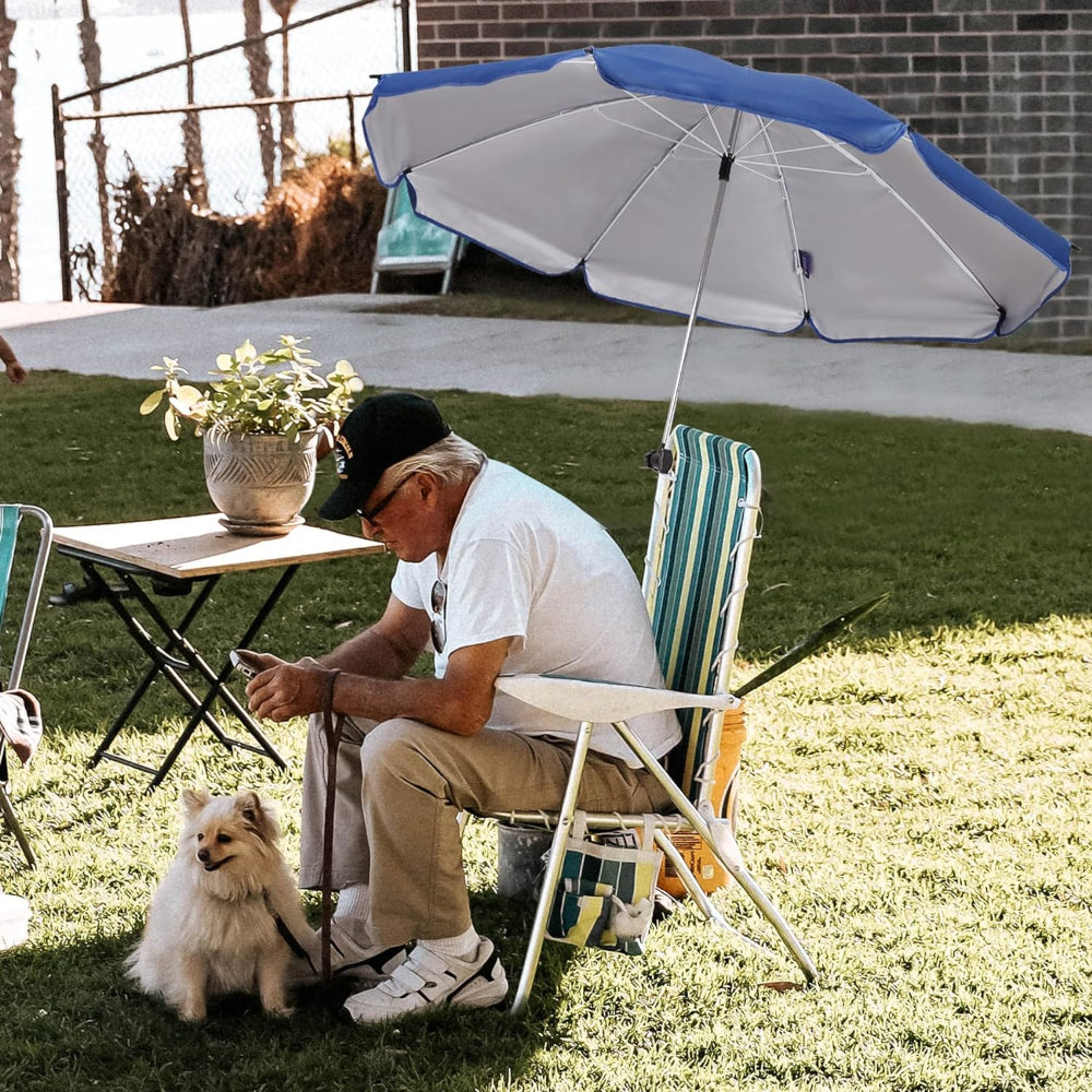 A man sitting on a chair with Navy Blue AMMSUN 43 inches table umbrellas for chair with universal clamp