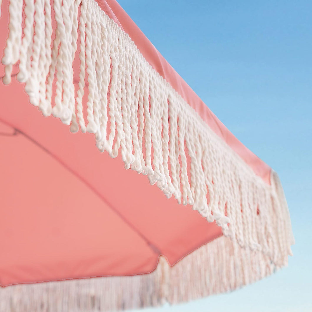 AMMSUN 7ft pink garden umbrellas outdoor adorned with white fringe, showcasing a stylish and playful design