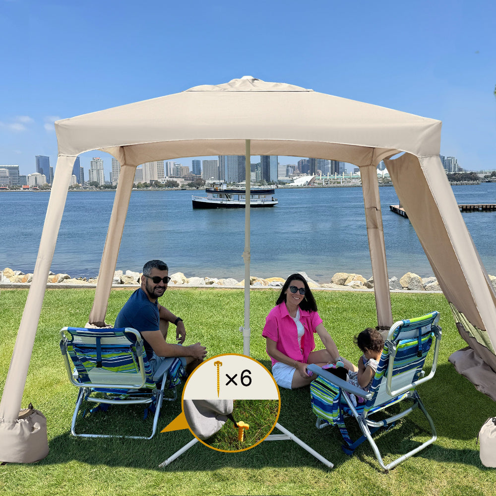 A family sitting under AMMSUN 6.2'×6.2' vintage beige beach canopy tent sun shade with sunwall on grass