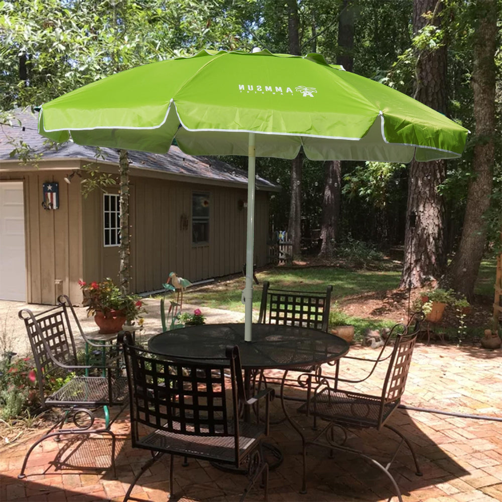 A patio table with chairs is set beneath an AMMSUN green 6.5ft uv protection umbrella mbrella outdoor patio 