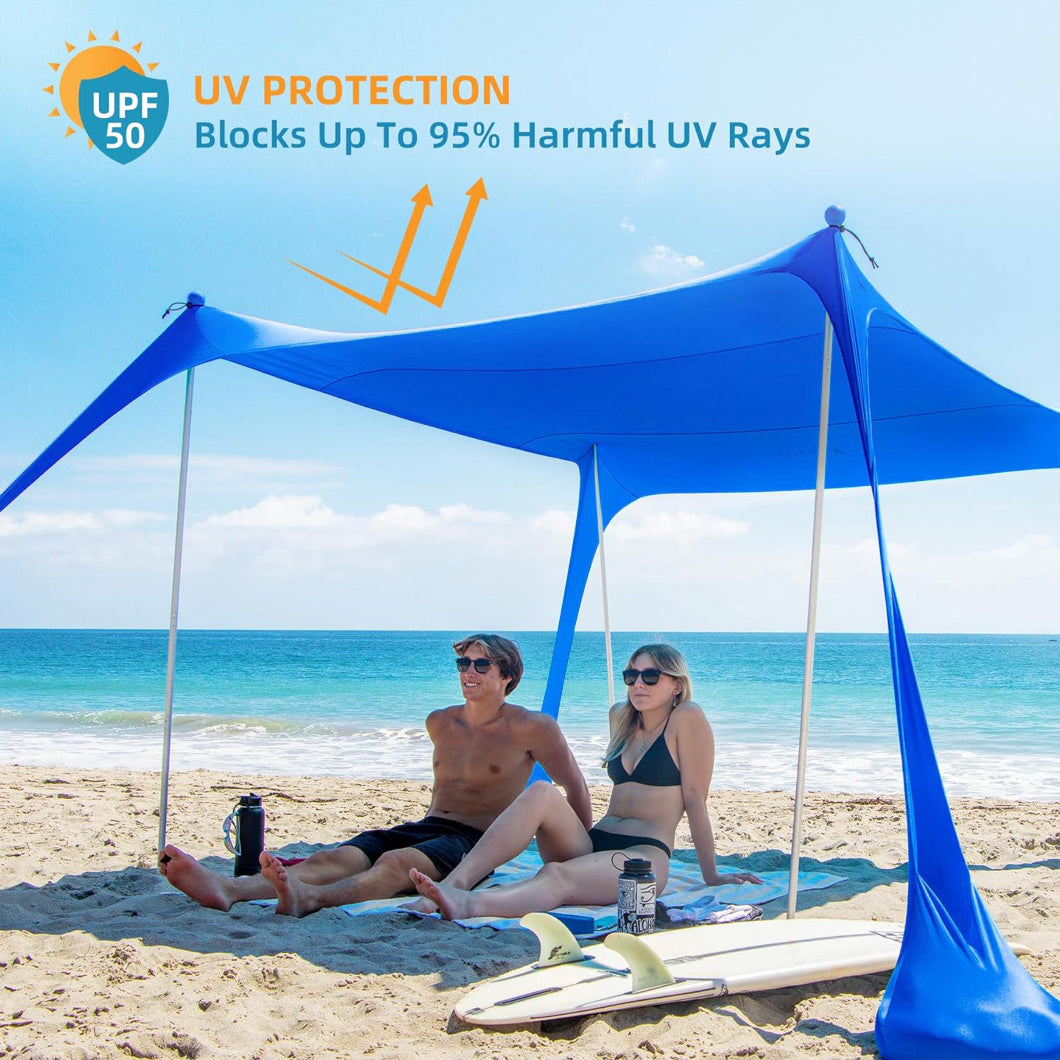 Two people lying under AMMSUN 9x9ft blue portable lycra beach tent canopy with UPF50+