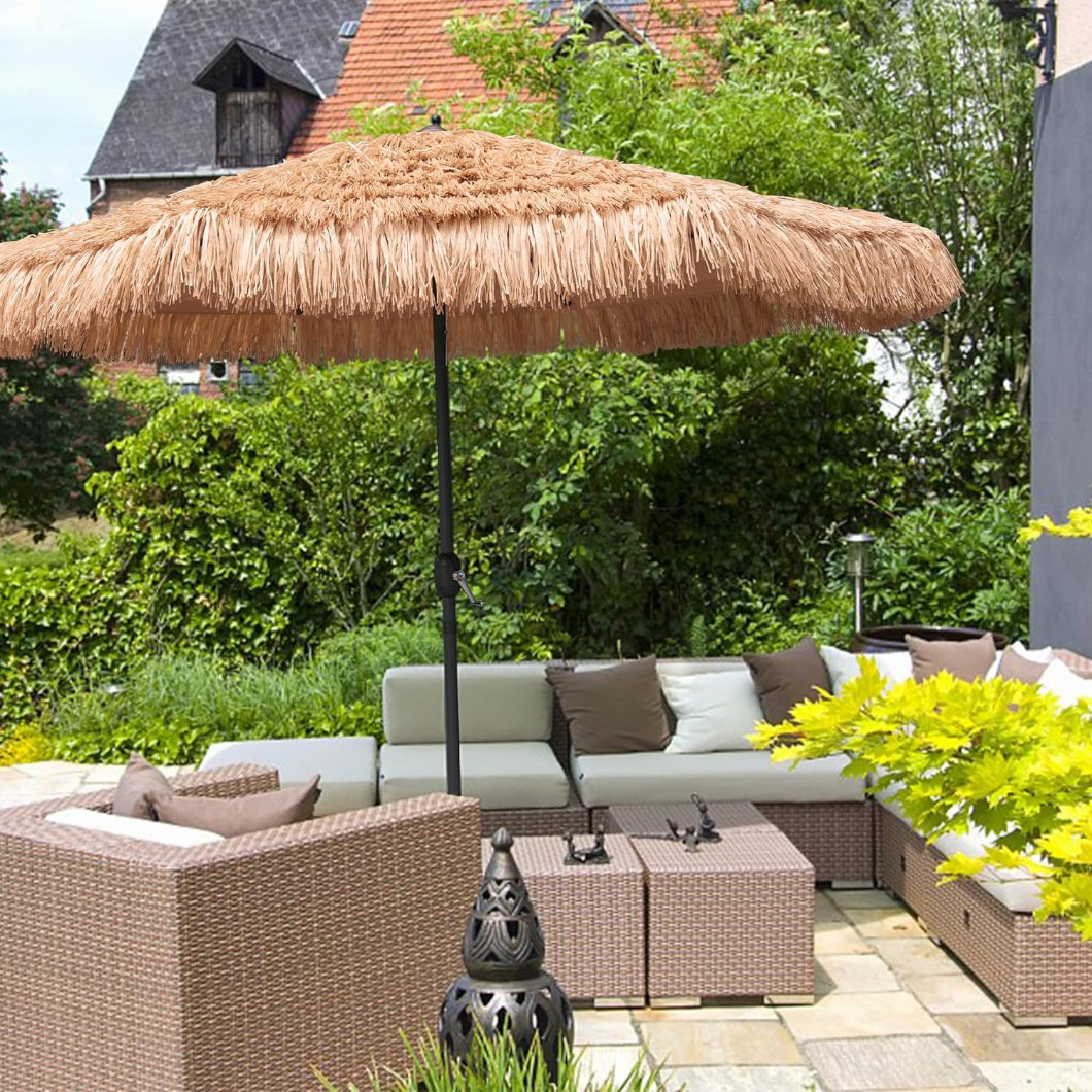 A serene patio featuring an AMMSUN 9ft Hula Thatched Tiki umbrella outdoor patio providing shade on a sunny day