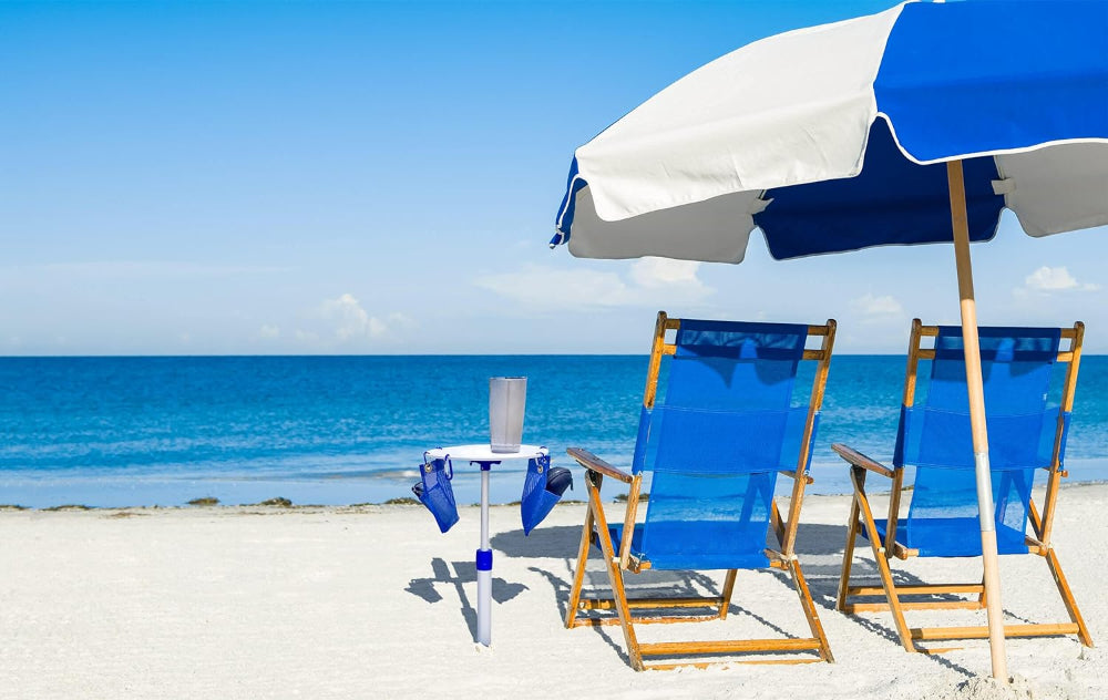 Two beach chairs under a blue white AMMSUN 7.5ft commercial grade wood pole heavy duty beach umbrella