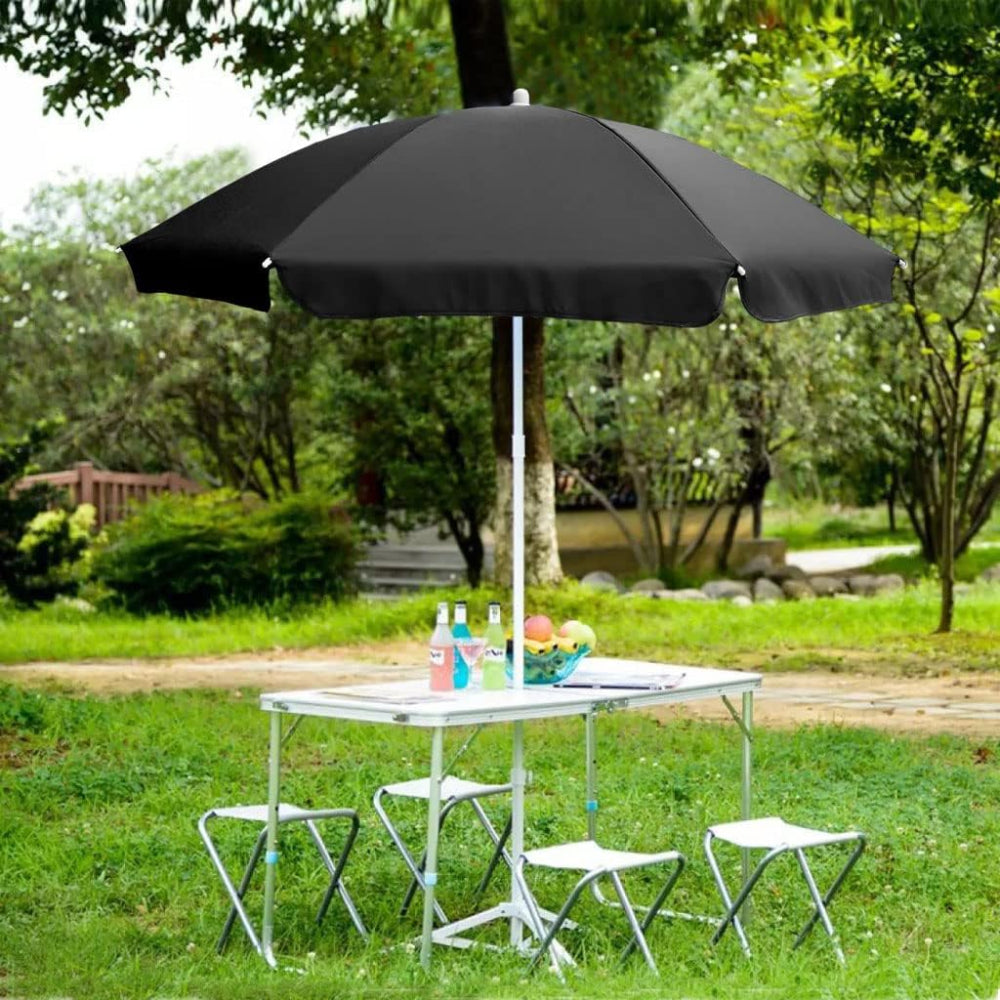 A black AMMSUN 6ft beach umbrella windproof for picnic table umbrellas is displayed on a picnic table