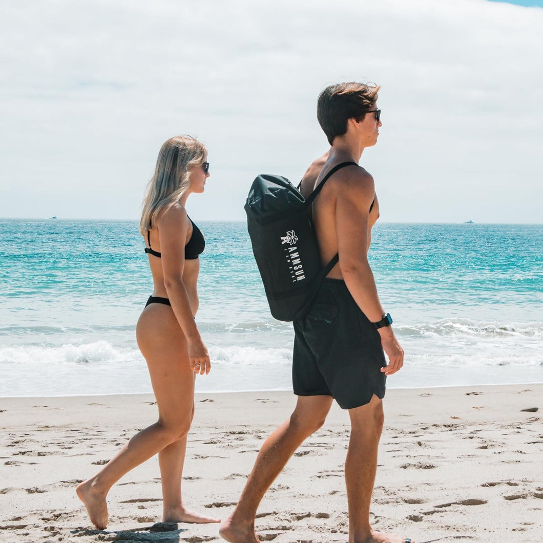 Two people walking on beach with a bag for AMMSUN 9x9ft light blue portable lycra beach tent umbrella