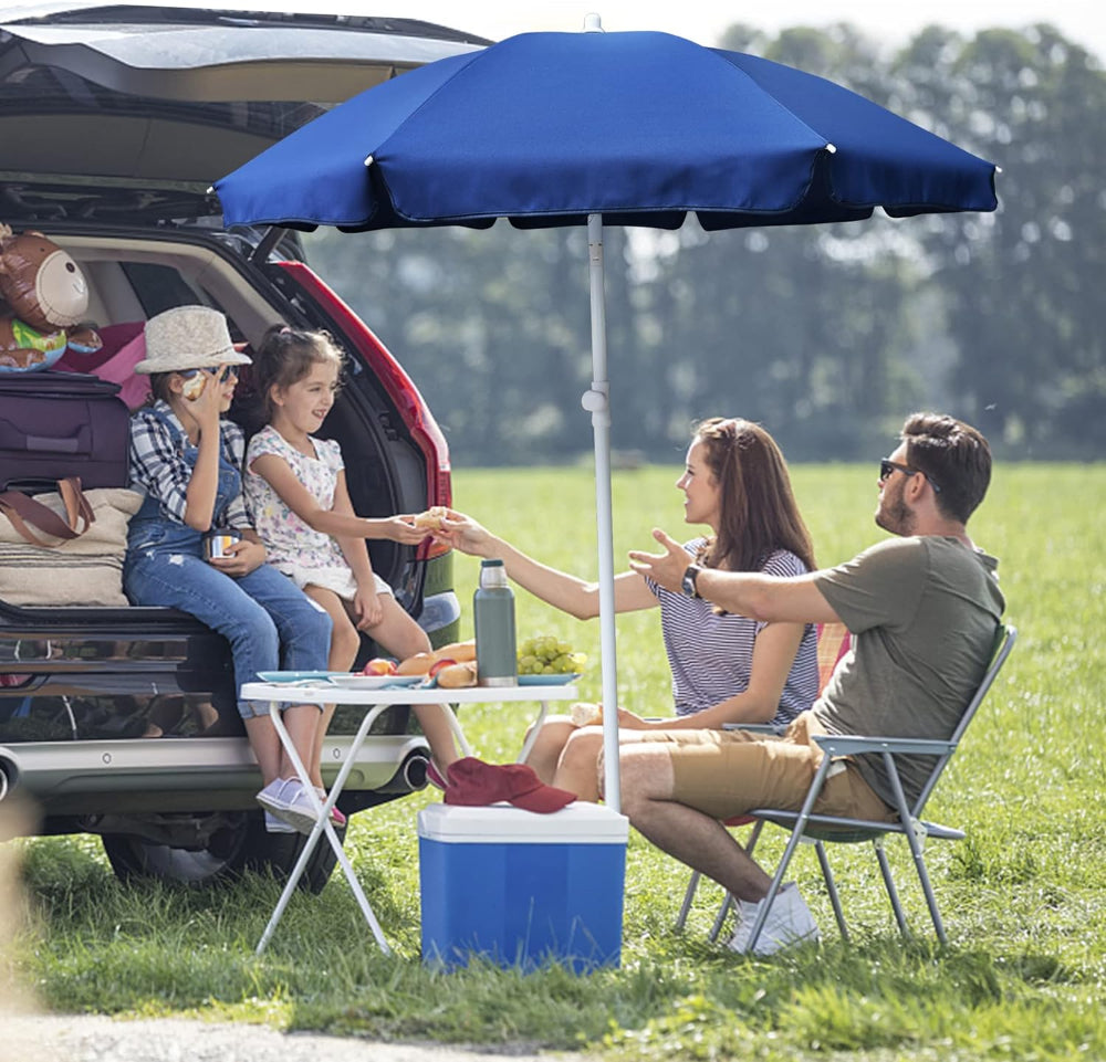 A couple sitting under AMMSUN 6FT blue clearance umbrella patio gazes at their two children sitting on car's trunk