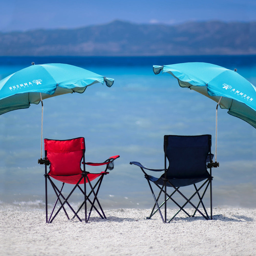 Two sky blue AMMSUN 52 inches wind resistant beach umbrellas for chair with universal clamp on the beach chairs