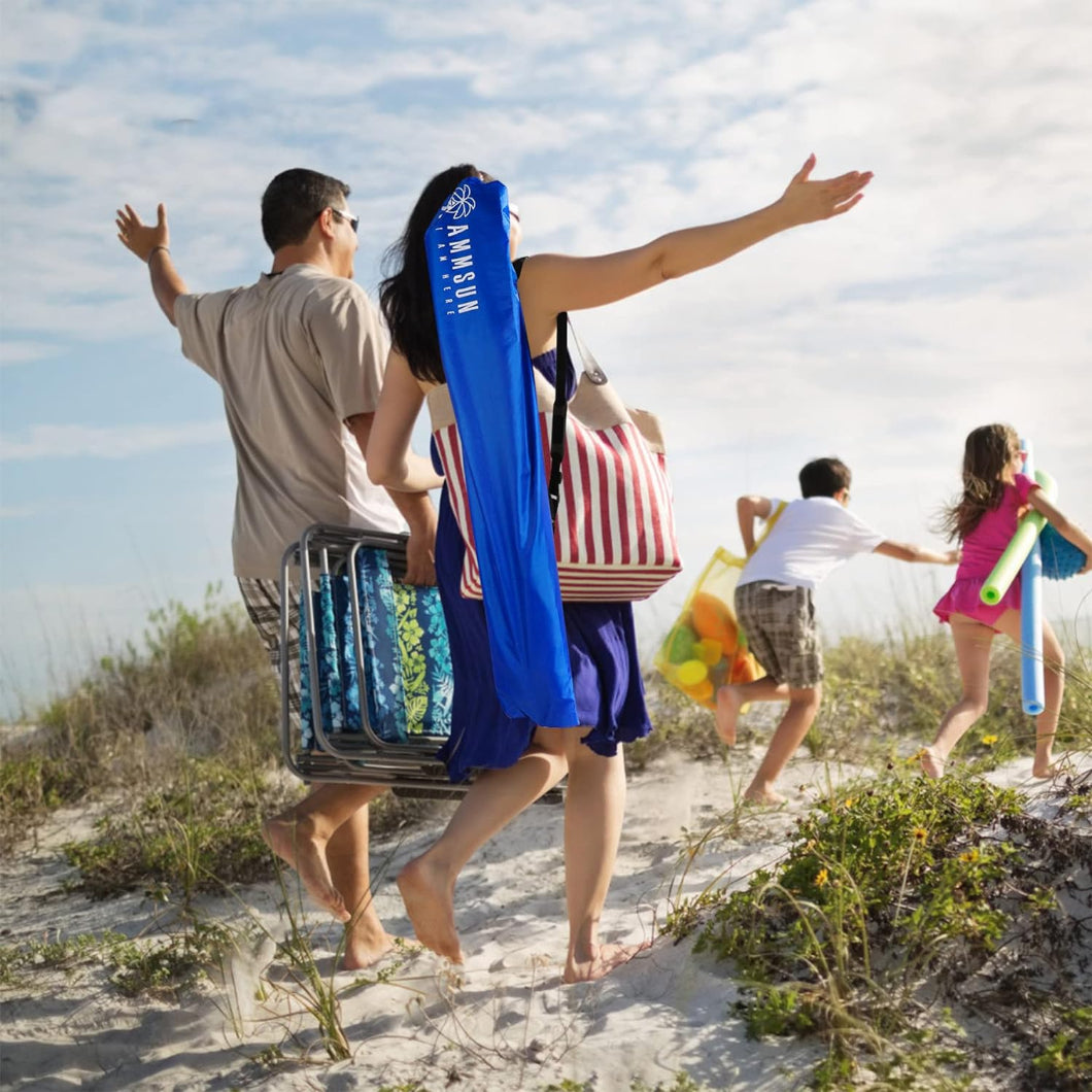 A family of four enjoys a beach walk, arms raised, with a AMMSUN 6.5ft blue portable beach umbrella portable in bag